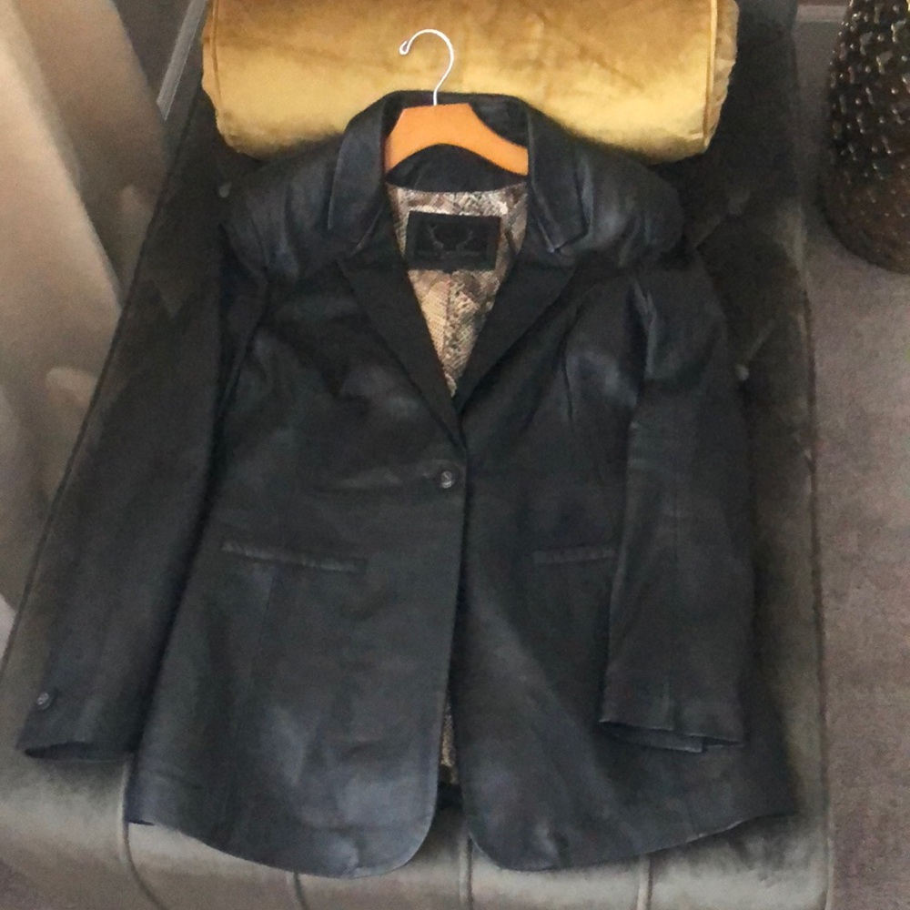 Soft black leather blazer. Runs slim.